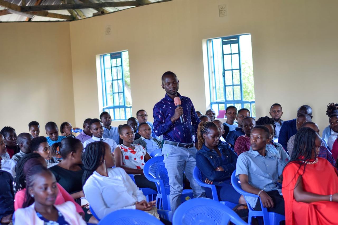 Internship cohort member contributing during an interactive session