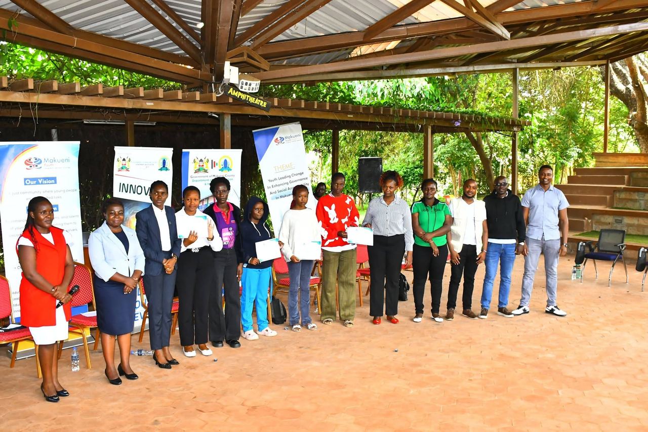 Youth governance forum participants with their certificates at the amphitheatre
