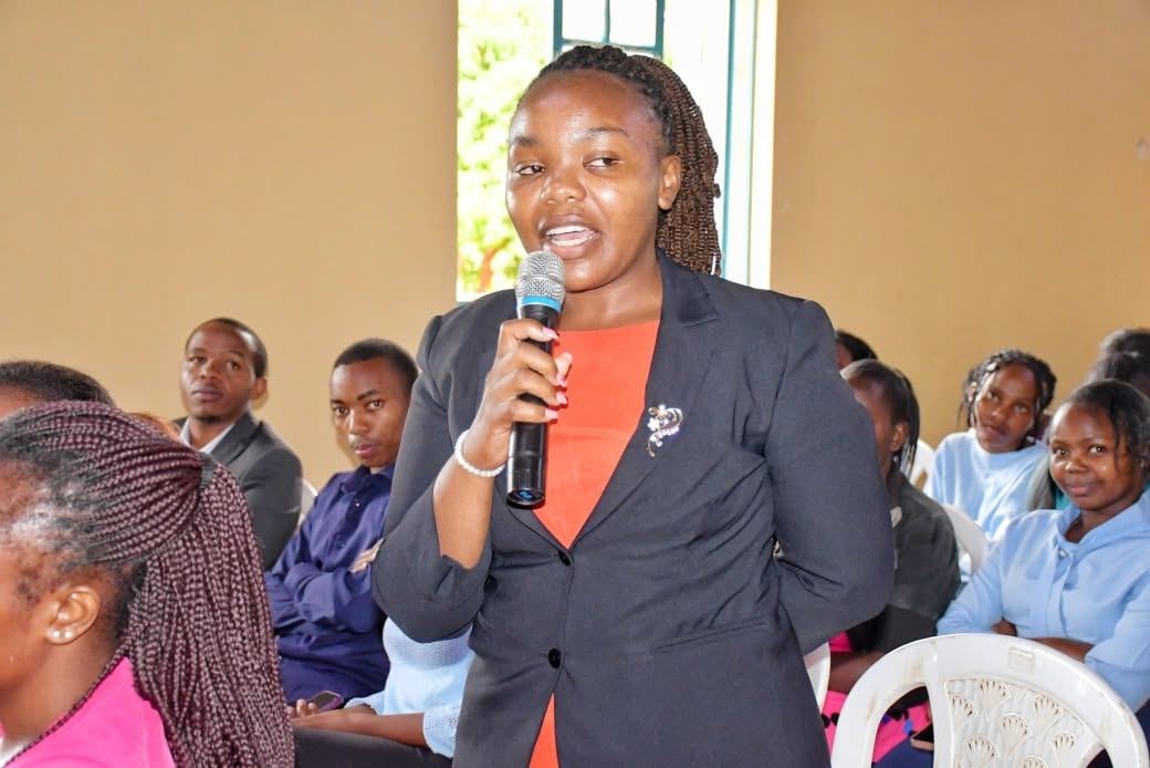 Young participant contributing during a county youth forum